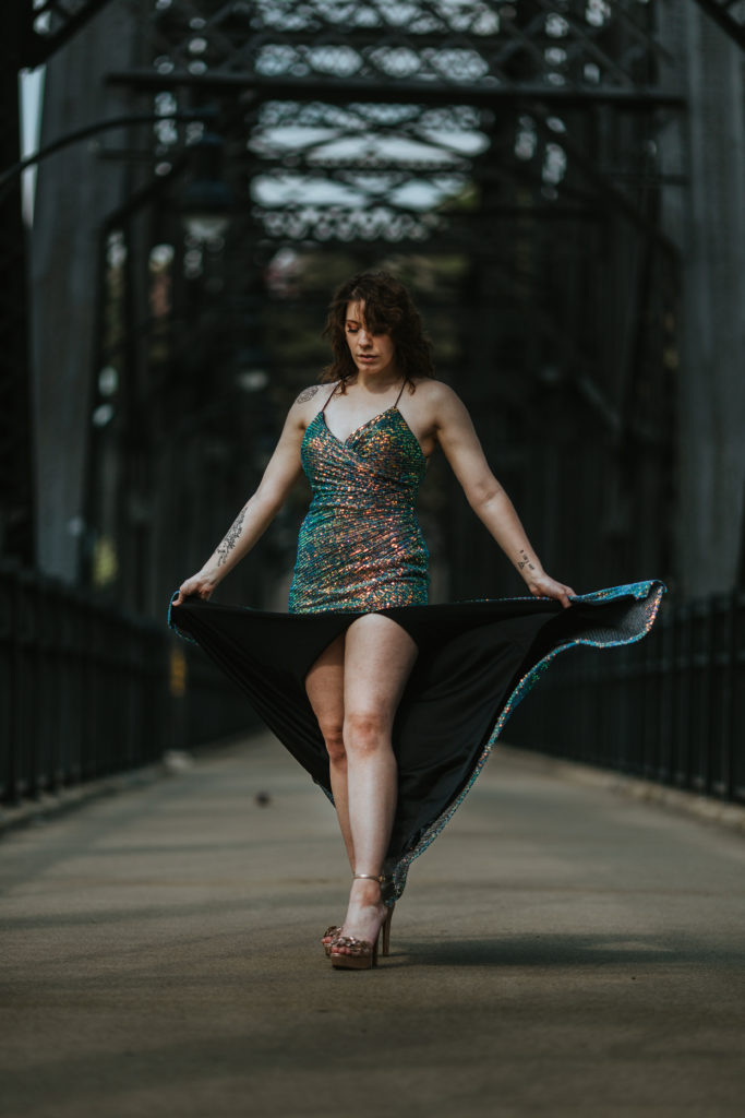 Natalie Vaia twirling her dress on the Hot Metal Bridge in Pittsburgh